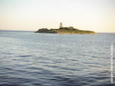 Фото одного из Соловецких островов в море
